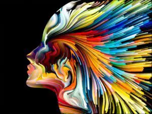 Colorful abstract profile of a human face with vibrant flowing lines.