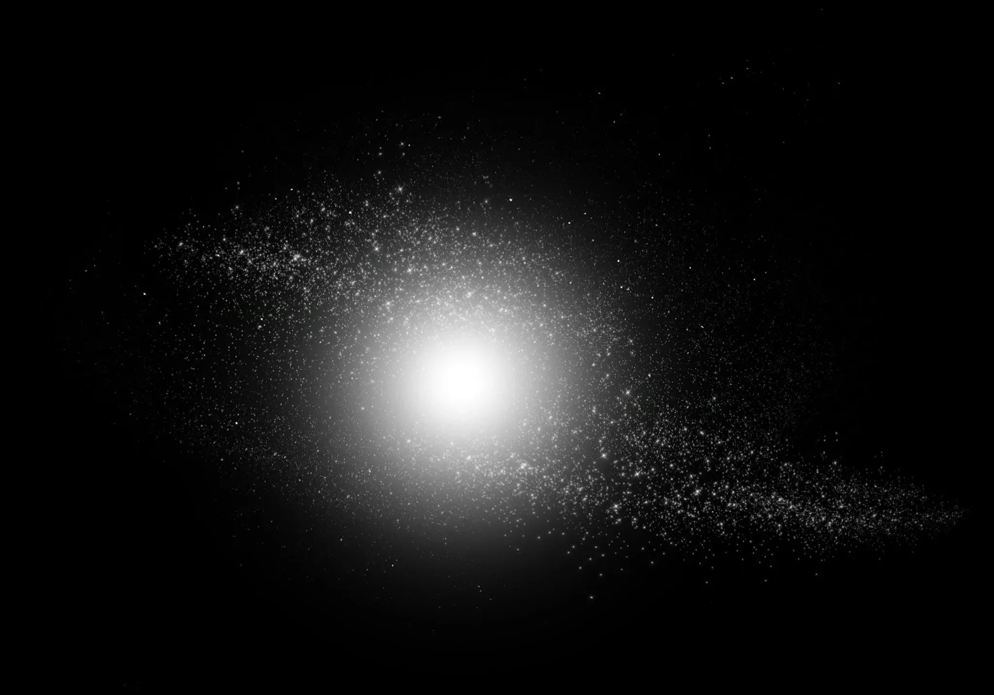Bright central glow with surrounding specks on a black background.