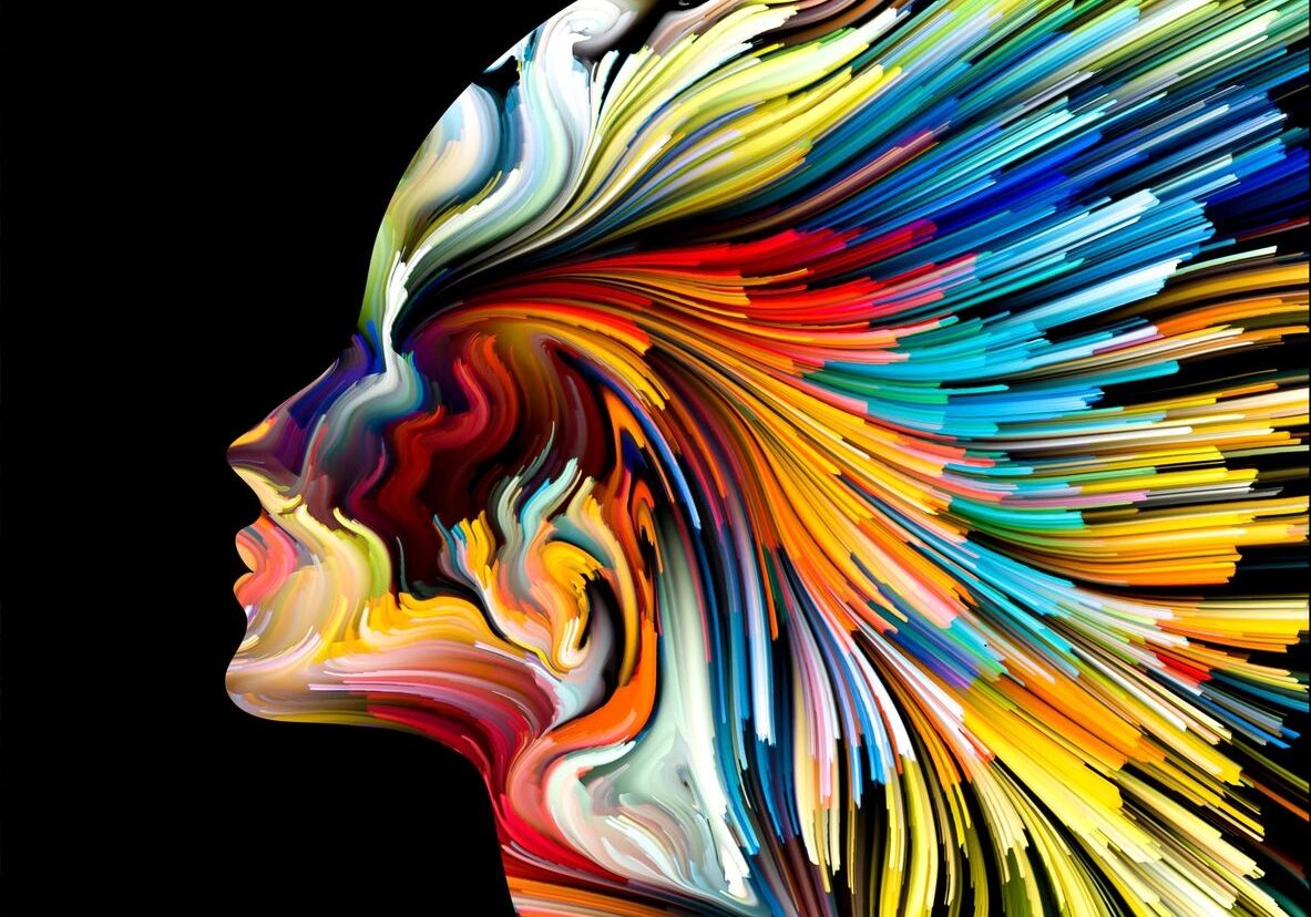 Colorful abstract profile of a human face with vibrant flowing lines.